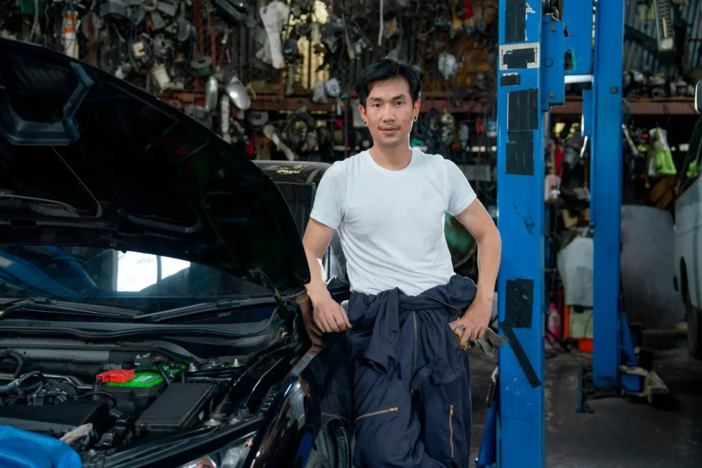 portrait of asian mechanic man stand